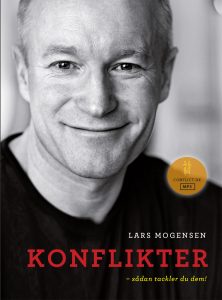Bog med Lars Mogensen